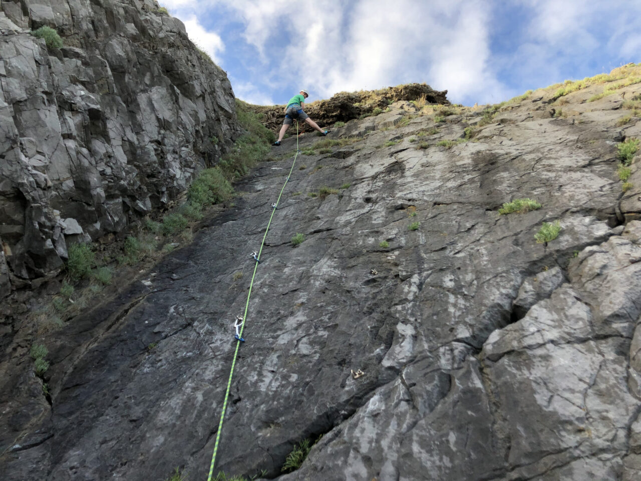 Climbing at top of route